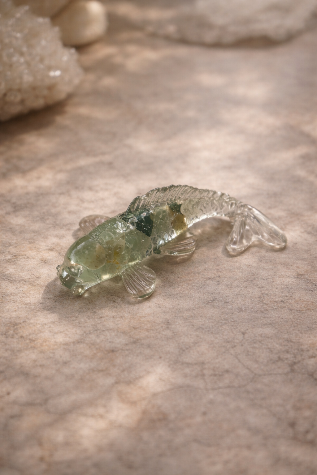 Crystal koi charm symbolising luck, prosperity and protection