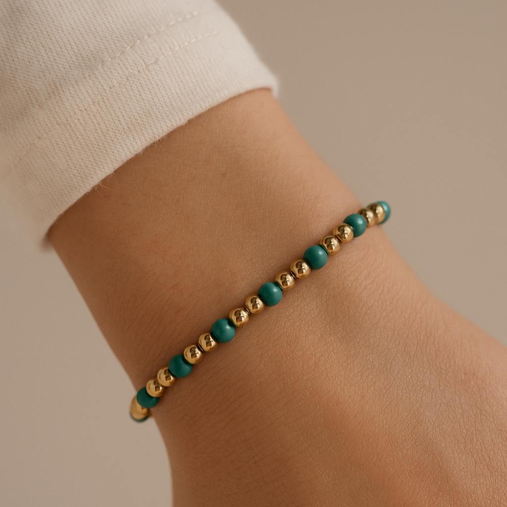 Elegant handmade bracelet with turquoise and gold beads, throat chakra healing jewellery.