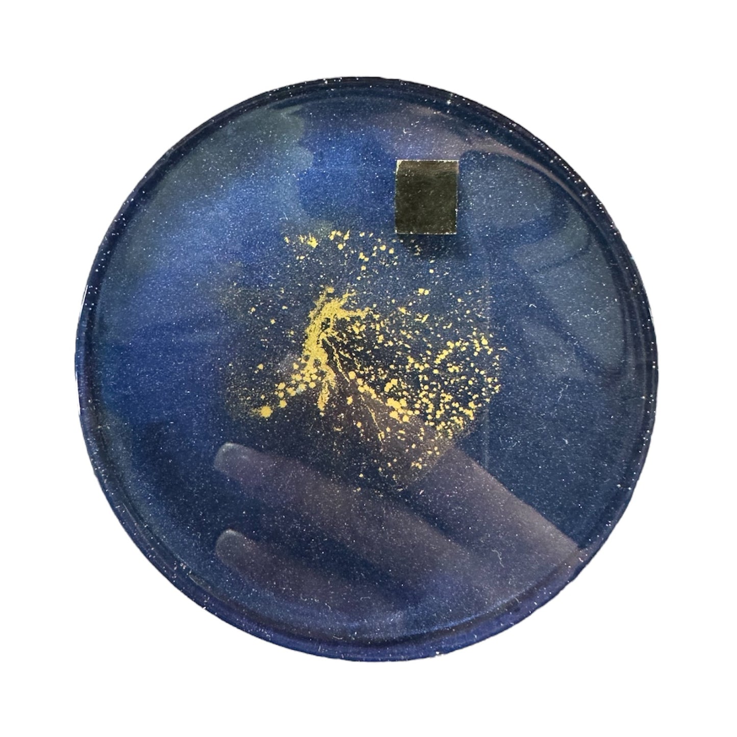 Handmade navy resin coaster with gold and pyrite detailing, circular shape.