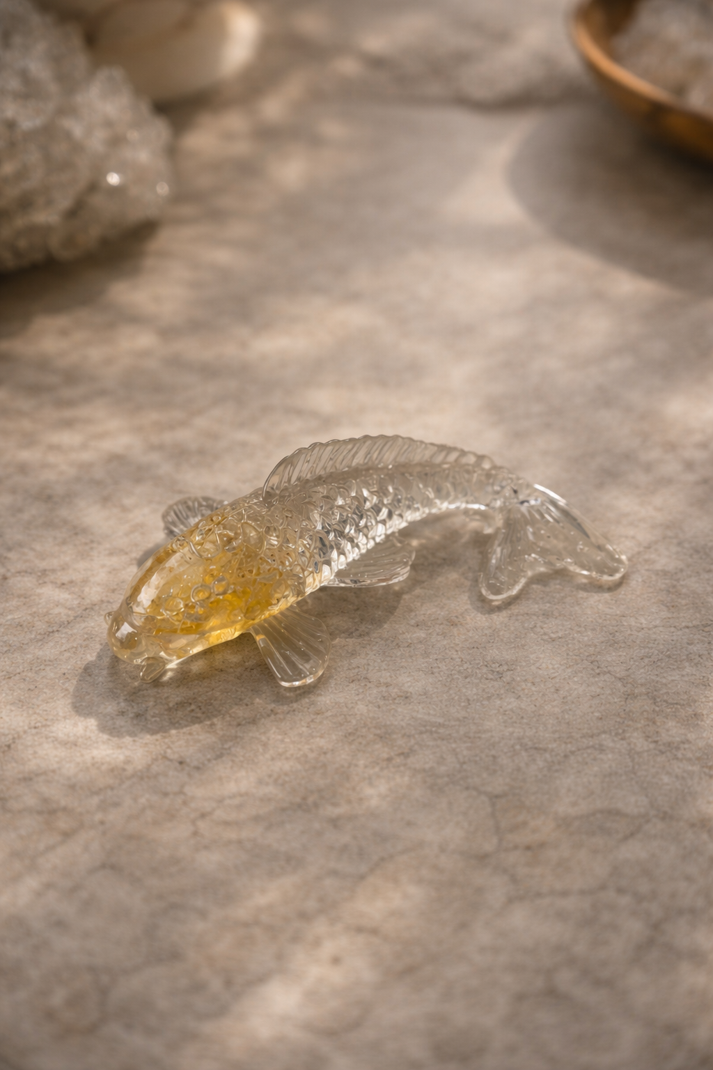 Crystal koi charm symbolising luck, prosperity and protection