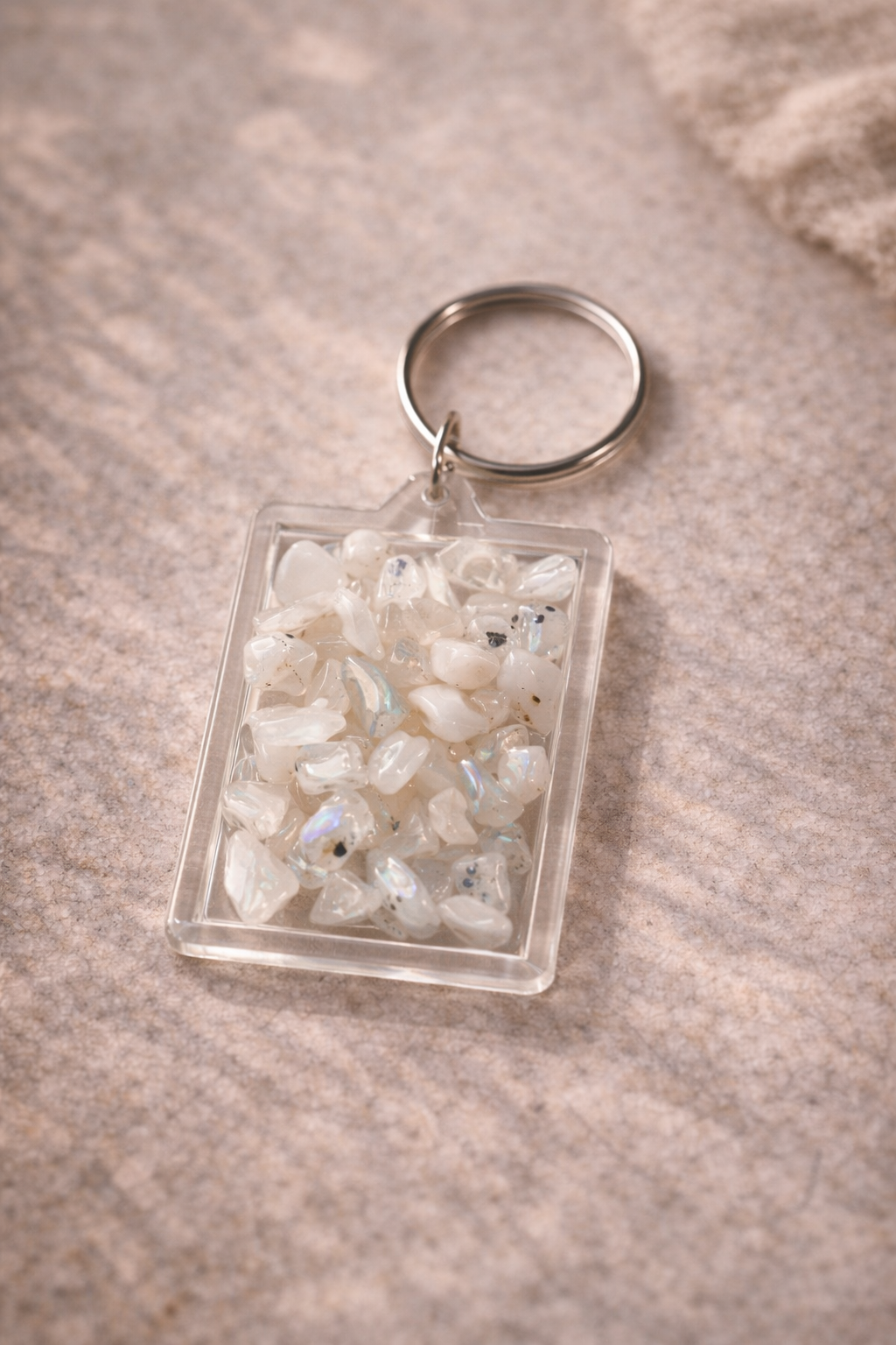 Pocket Energy Keyring with rainbow moonstone crystal chips supporting intuition and emotional balance.