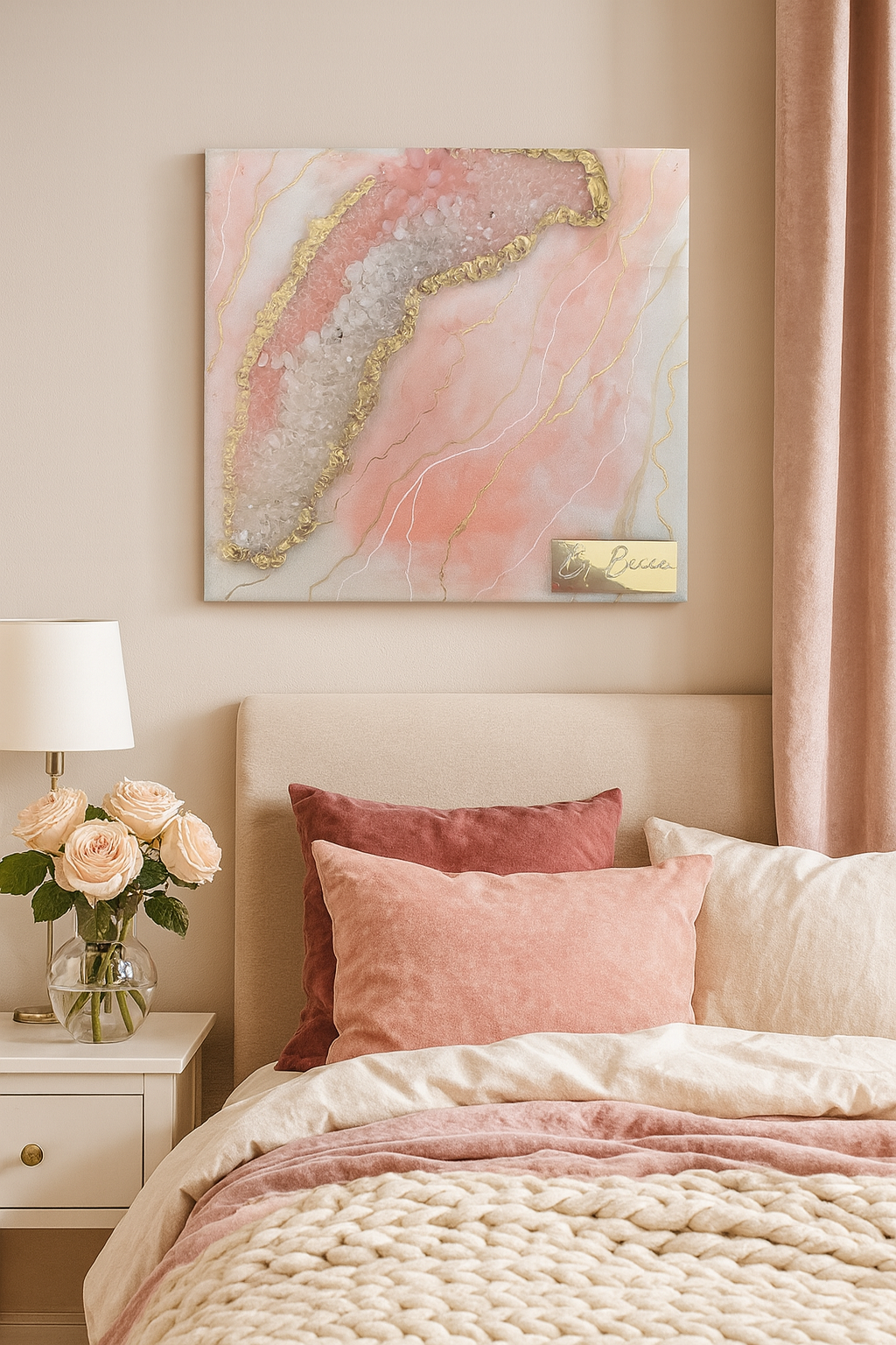 Rose quartz geode resin artwork with gold foil detail hung above a luxury feminine bedroom bed.